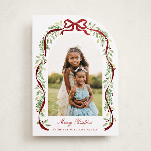 This is a cardinal foil pressed holiday cards with foil pressed by Sarah Knight called ribbon arch printing on recycled smooth signature in standard