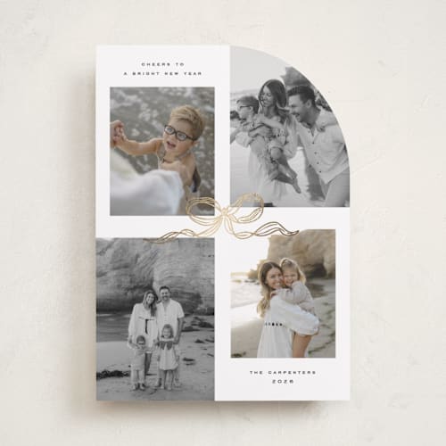 This is a vanilla foil pressed holiday cards with foil pressed by Creo Study called shimmering bow tie printing on recycled smooth signature in standard