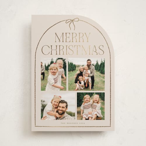 This is a buttercream foil pressed holiday cards with foil pressed by Vivian Yiwing called frame bow printing on recycled smooth signature in standard