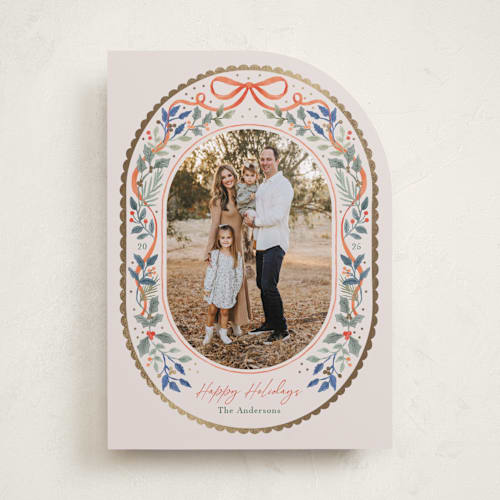 This is a holly foil pressed holiday cards with foil pressed by Elly called a gentle bow printing on recycled smooth signature in standard