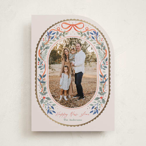 This is a holly foil pressed holiday cards with foil pressed by Elly called a gentle bow printing on recycled smooth signature in standard