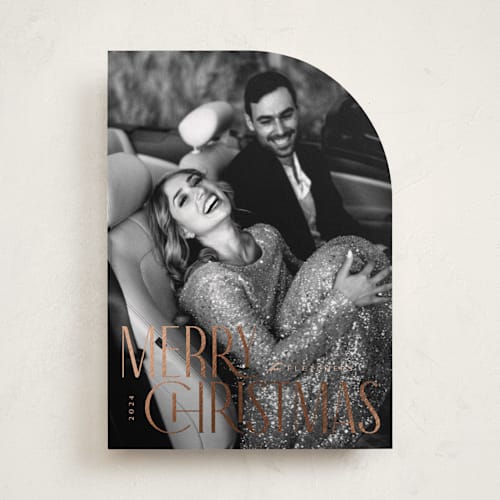 This is a winter rose foil pressed holiday cards with foil pressed by Erica Krystek called christmas stack printing on recycled smooth signature in standard