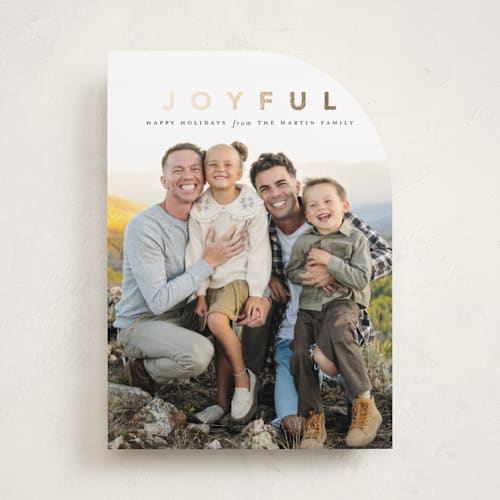 This is a coal foil pressed holiday cards with foil pressed by Laura Hamm called a joyful family printing on recycled smooth signature in standard