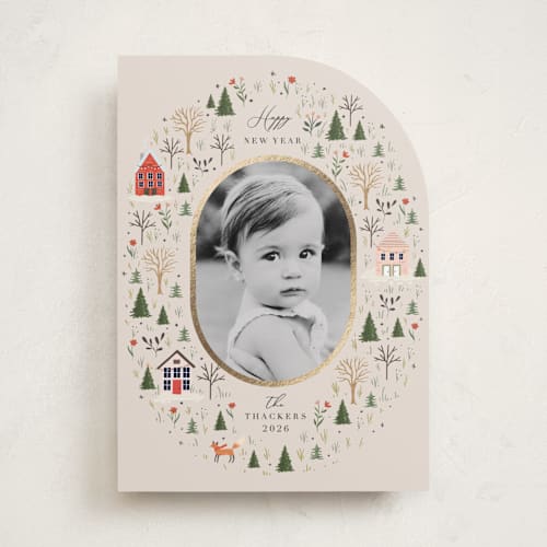 This is a taffy foil pressed holiday cards with foil pressed by Hannah Williams called winter village oval printing on recycled smooth signature in standard
