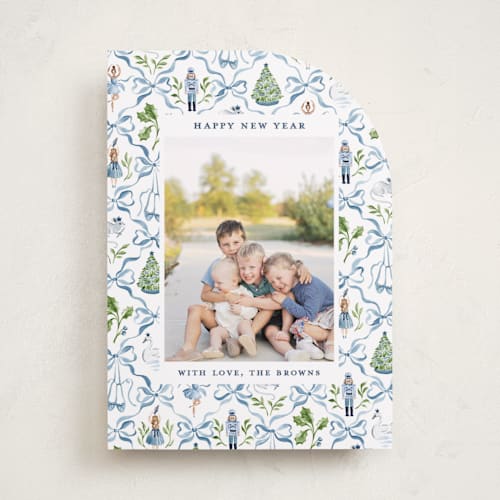 This is a blue ribbon holiday photo cards with standard by Sarah Knight called nutcracker ribbons printing on recycled smooth signature in standard