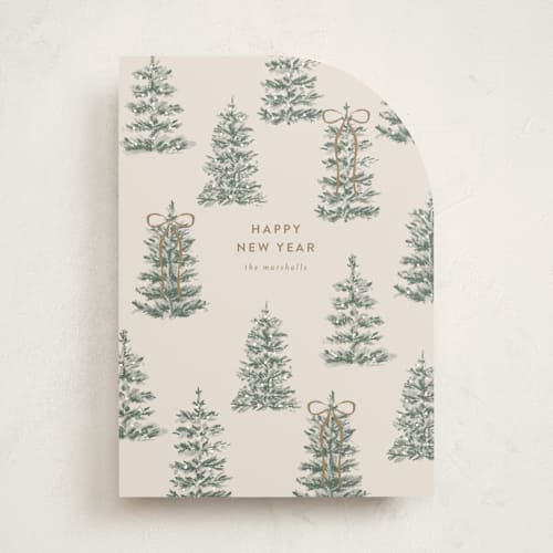 This is a champagne non photo holiday cards with standard by Angela Garrick called festive forest printing on signature in standard