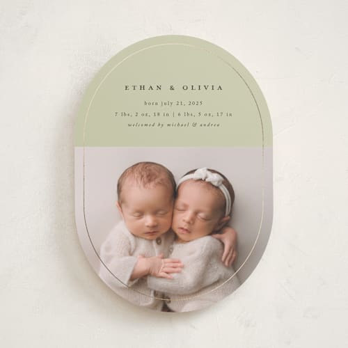 This is a sage foil stamped birth announcements with foil pressed by Stacy Maalouf called oval announcement printing on recycled smooth signature in standard