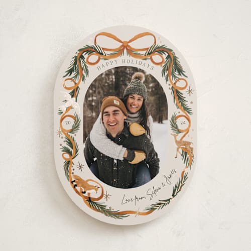 This is a cinnamon foil pressed holiday cards with foil pressed by Elly called winter ribbon printing on recycled smooth signature in standard