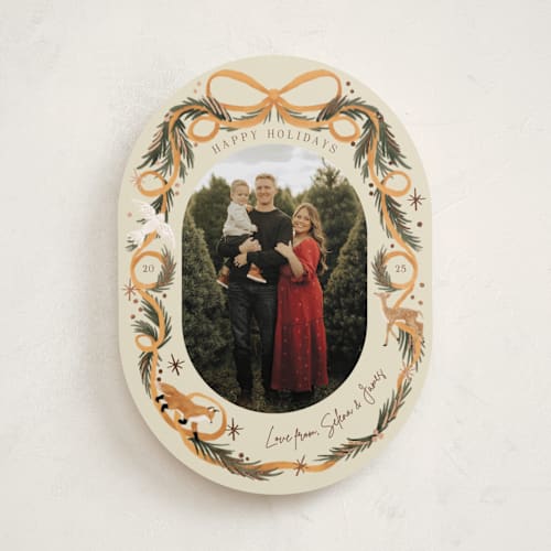 This is a sunset foil pressed holiday cards with foil pressed by Elly called winter ribbon printing on recycled smooth signature in standard