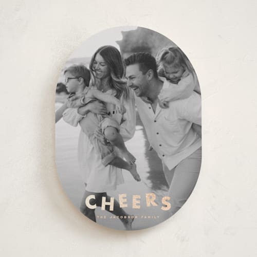 This is a champagne foil pressed holiday cards with foil pressed by Ellen Schlegelmilch called glitter cheers printing on recycled smooth signature in standard