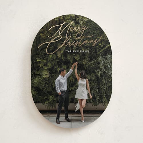 This is a snowfall foil pressed holiday cards with foil pressed by Melanie Kosuge called merry monoline printing on recycled smooth signature in standard