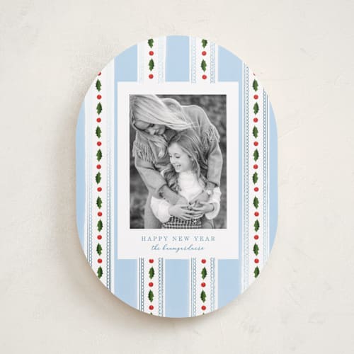 This is a robin's egg foil pressed holiday cards with foil pressed by Baumbirdy called holly frames printing on recycled smooth signature in standard