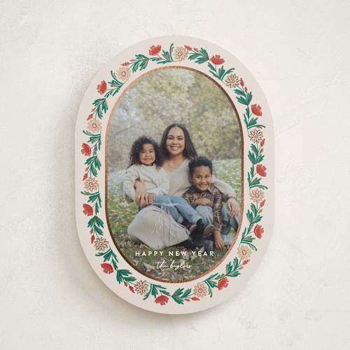 This is a eggnog foil pressed holiday cards with foil pressed by Amy Kross called laurel edge printing on recycled smooth signature in standard