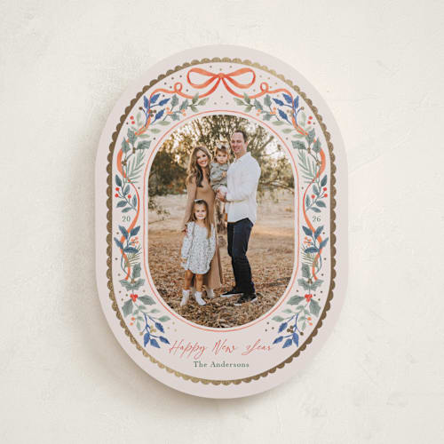 This is a holly foil pressed holiday cards with foil pressed by Elly called a gentle bow printing on recycled smooth signature in standard