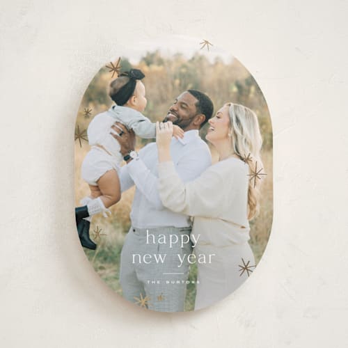 This is a snow foil pressed holiday cards with foil pressed by Wildfield Paper Co called twinkle! printing on recycled smooth signature in standard