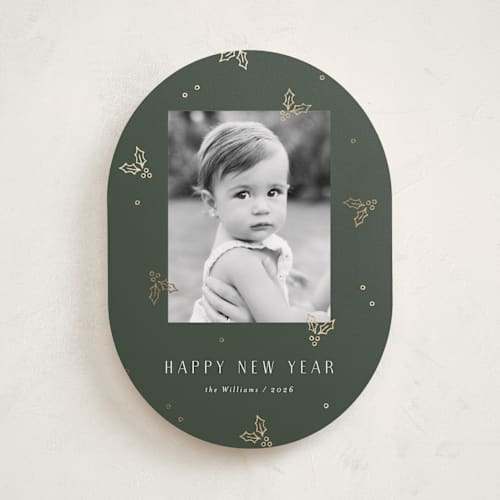 This is a evergreen foil pressed holiday cards with foil pressed by Michelle Taylor called jolly holly printing on recycled smooth signature in standard