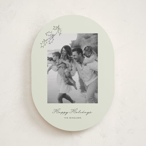 This is a lime holiday photo cards with standard by Angela Garrick called hung holly printing on recycled smooth signature in standard