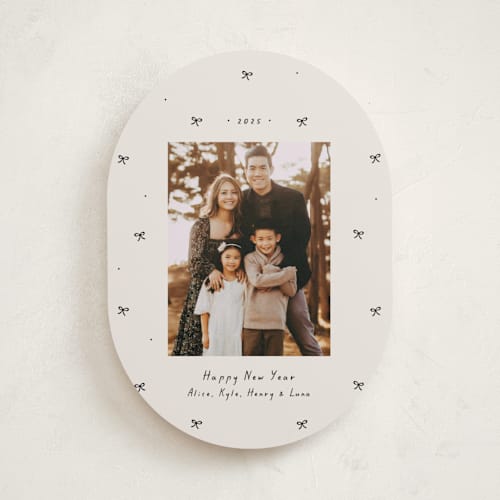 This is a vanilla holiday photo cards with standard by Lea Delaveris called little bows printing on recycled smooth signature in standard