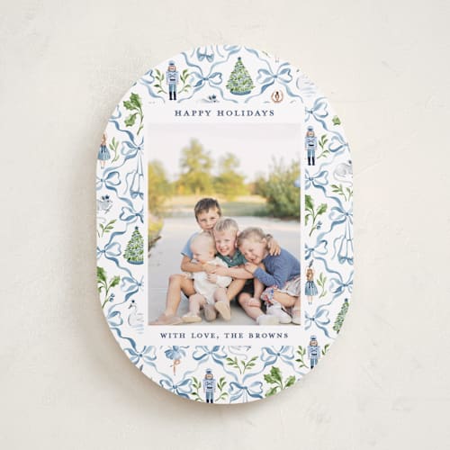 This is a blue ribbon holiday photo cards with standard by Sarah Knight called nutcracker ribbons printing on recycled smooth signature in standard
