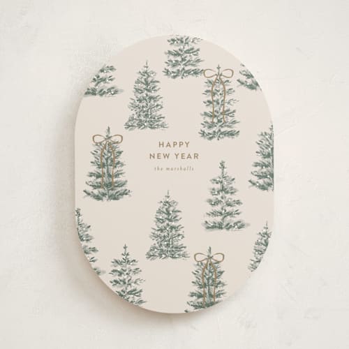 This is a champagne non photo holiday cards with standard by Angela Garrick called festive forest printing on signature in standard