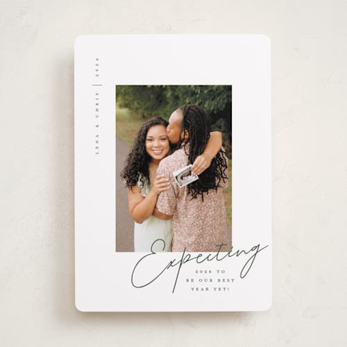 This is a evergreen babys first christmas with standard by Olivia Raufman called best year yet printing on recycled smooth signature in standard