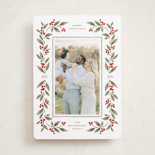This is a mistletoe photo christmas cards with standard by Wildfield Paper Co called poinsettia + pine printing on recycled smooth signature in standard