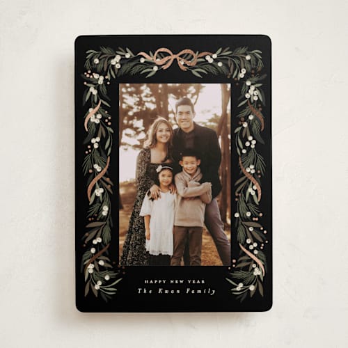 This is a charcoal foil pressed holiday cards with foil pressed by Leah Bisch called greenery garland printing on recycled smooth signature in standard