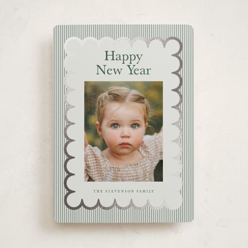 This is a evergreen foil pressed holiday cards with foil pressed by Nicoletta Savod called charm printing on recycled smooth signature in standard