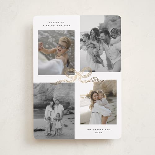 This is a vanilla foil pressed holiday cards with foil pressed by Creo Study called shimmering bow tie printing on recycled smooth signature in standard