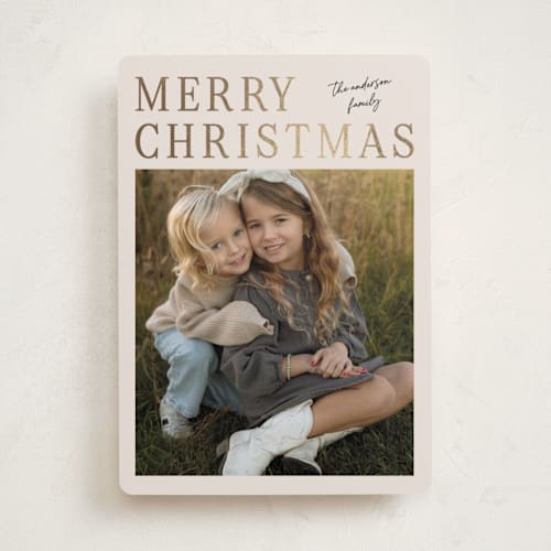 This is a cream foil pressed holiday cards with foil pressed by Ilene Guy called modern merry printing on recycled smooth signature in standard