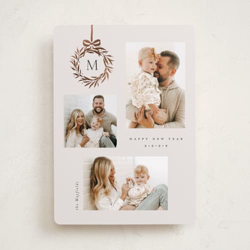 This is a vanilla foil pressed holiday cards with foil pressed by Melanie Kosuge called monogram trio printing on recycled smooth signature in standard