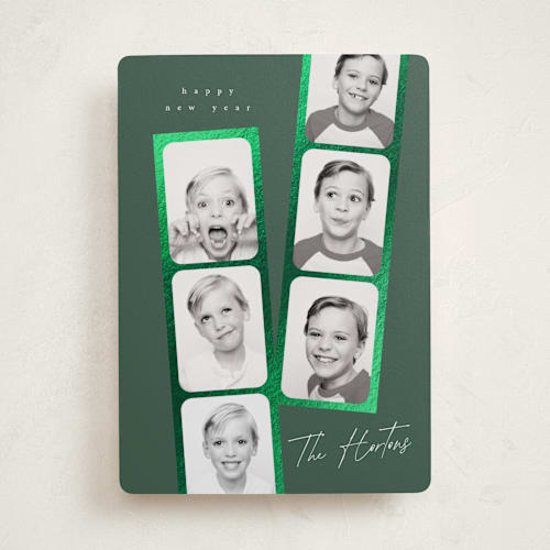 This is a forest foil pressed holiday cards with foil pressed by Leah Bisch called snapshots printing on recycled smooth signature in standard