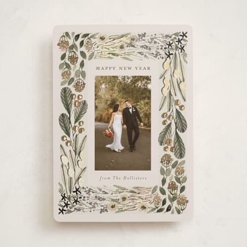 This is a sage foil pressed holiday cards with foil pressed by Meagan Christensen called abundance printing on recycled smooth signature in standard