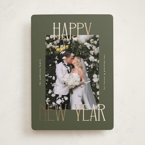 This is a juniper foil pressed holiday cards with foil pressed by Kelly Watkins called maeve printing on recycled smooth signature in standard