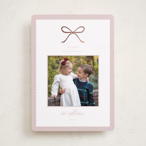 This is a winter rose foil pressed holiday cards with foil pressed by Emily Betts called scallop bow printing on recycled smooth signature in standard