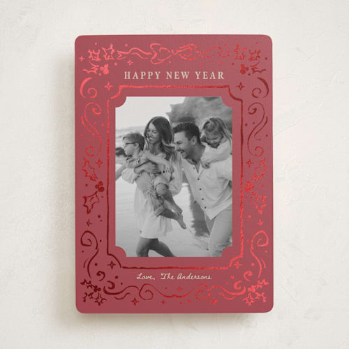 This is a crimson foil pressed holiday cards with foil pressed by Cass Loh called holly whirl printing on recycled smooth signature in standard