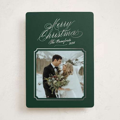 This is a evergreen foil pressed holiday cards with foil pressed by Alston Foster called silver bells printing on recycled smooth signature in standard