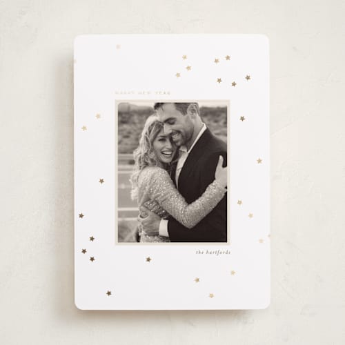 This is a cloud foil pressed holiday cards with foil pressed by Ellen Schlegelmilch called glittering stars printing on recycled smooth signature in standard