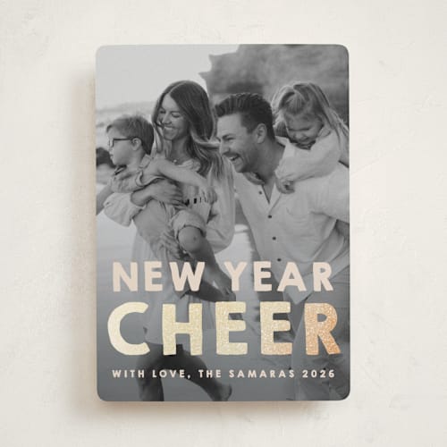 This is a cream foil pressed holiday cards with foil pressed by Snow and Ivy called nyc printing on recycled smooth signature in standard