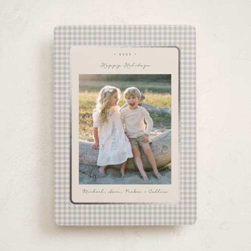 This is a ash foil pressed holiday cards with foil pressed by Emily Betts called gingham vintage printing on recycled smooth signature in standard