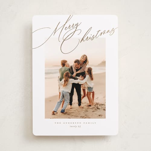 This is a golden foil pressed holiday cards with foil pressed by Jessica Williams called topper printing on recycled smooth signature in standard