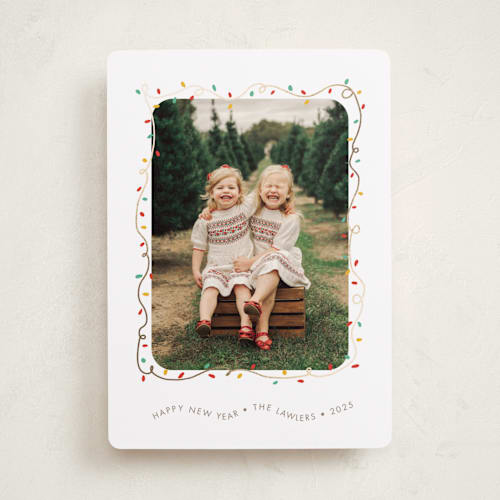 This is a frosting foil pressed holiday cards with foil pressed by Holly Whitcomb called crazy lights printing on recycled smooth signature in standard