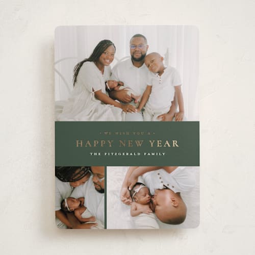 This is a eucalyptus foil pressed holiday cards with foil pressed by Wildfield Paper Co called quartzite printing on recycled smooth signature in standard
