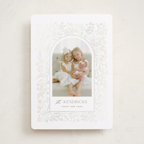 This is a sage gloss press holiday cards with gloss press by Ana Sharpe called botanica arch printing on recycled smooth signature in standard