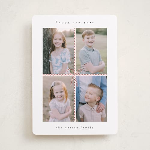 This is a candy cane holiday photo cards with standard by Dani Lugato called candy caner ribbon printing on recycled smooth signature in standard
