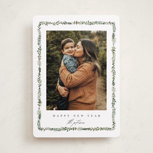 This is a pine holiday photo cards with standard by Susan Moyal called holly & jolly printing on recycled smooth signature in standard
