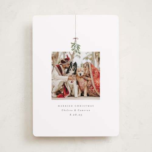This is a winter holiday photo cards with standard by Randi Cirelli called married and merry printing on recycled smooth signature in standard
