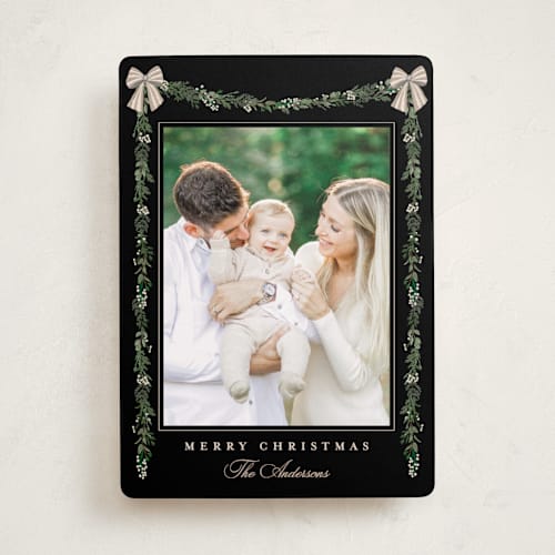 This is a coal holiday photo cards with standard by Susan Moyal called holly & bows printing on recycled smooth signature in standard