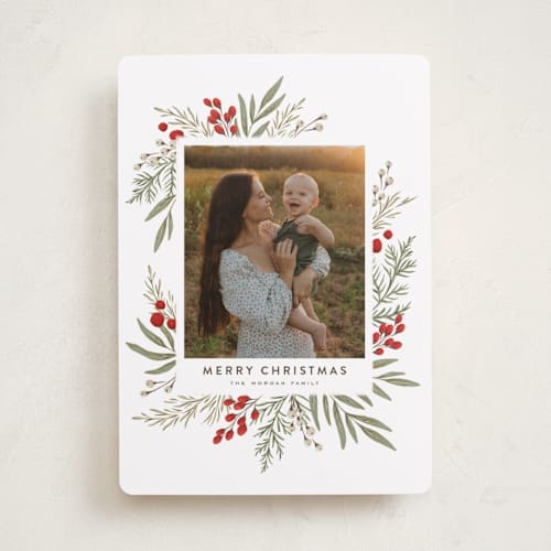 This is a winter holiday photo cards with standard by Wildfield Paper Co called holly + olive printing on recycled smooth signature in standard