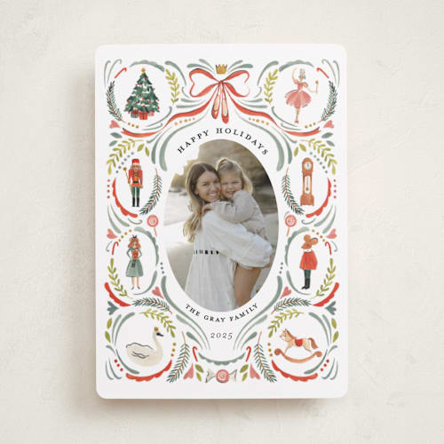 This is a holly leaf holiday photo cards with standard by Sarah Knight called nutcracker dance printing on recycled smooth signature in standard
